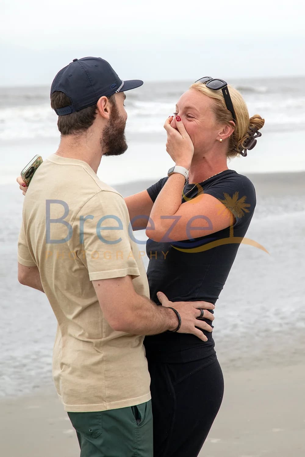Molly and Mitch on the beach after their proposal