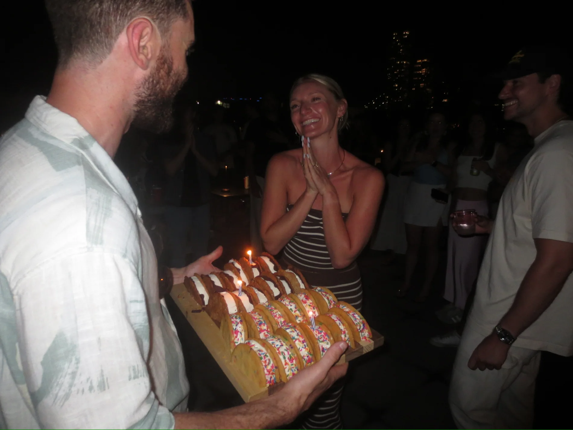 Molly smiling over birthday candles