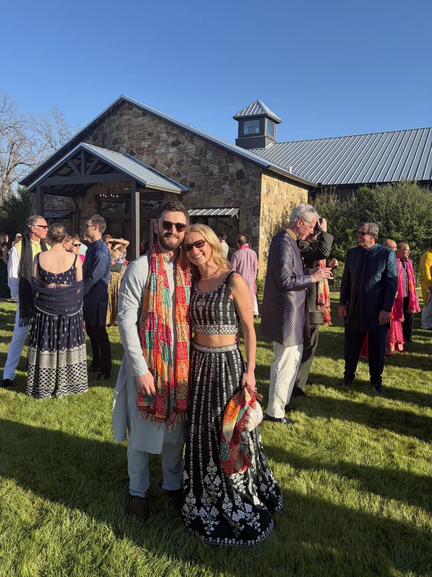 Molly and Mitch dressed for a sunny garden celebration
